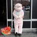 A pig mascot takes a break outside a bar on Broadway in downtown Nashville, Tenn. on Friday. Michigan is set to take on Ohio University at 7:20 p.m. Melanie Maxwell I AnnArbor.com